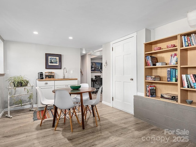 60 Fulton St, Asheville, NC 28801 - dining space with light wood-type flooring, baseboards, and recessed lighting