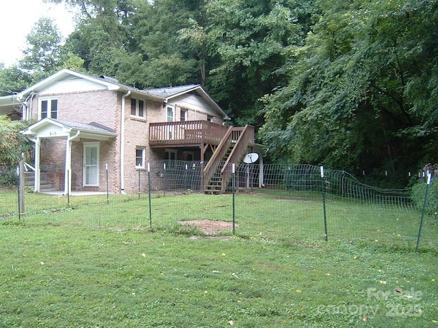 view of yard with a wooden deck