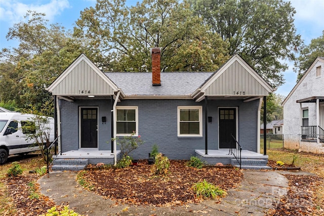 view of front of property featuring covered porch