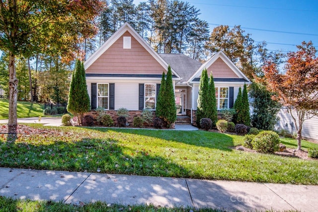 view of front of home featuring a front lawn