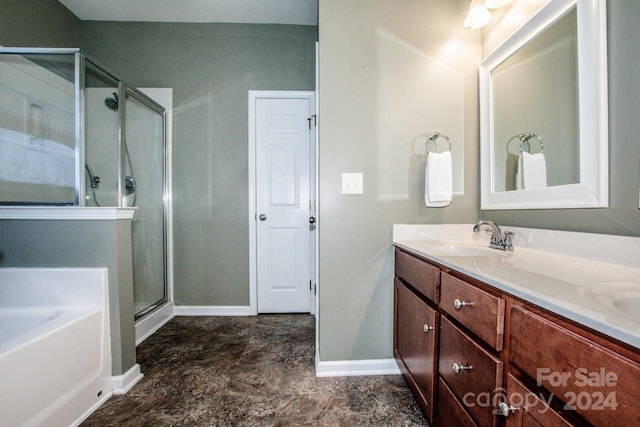 bathroom featuring vanity and separate shower and tub