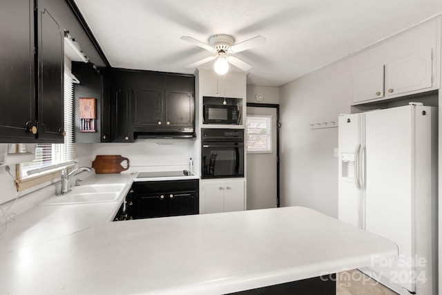 kitchen with black appliances, white cabinetry, sink, kitchen peninsula, and ceiling fan