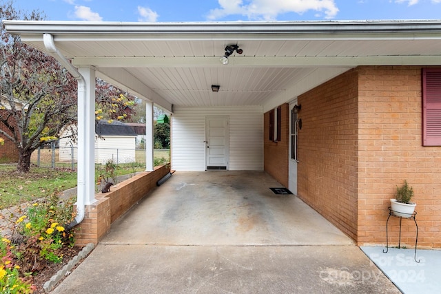 view of patio / terrace featuring a carport