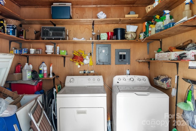 washroom featuring electric panel and independent washer and dryer