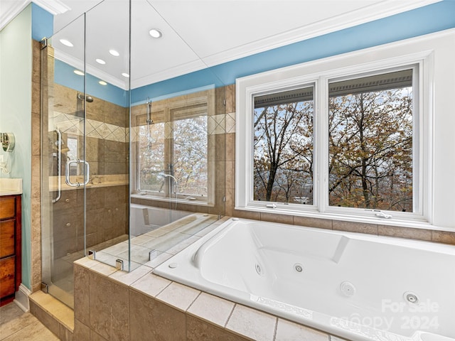 bathroom featuring plus walk in shower, tile patterned flooring, and crown molding