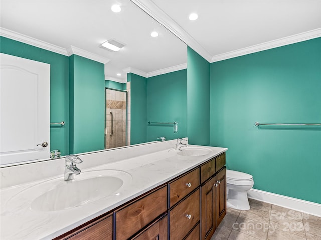 bathroom featuring ornamental molding, vanity, tiled shower, tile patterned floors, and toilet