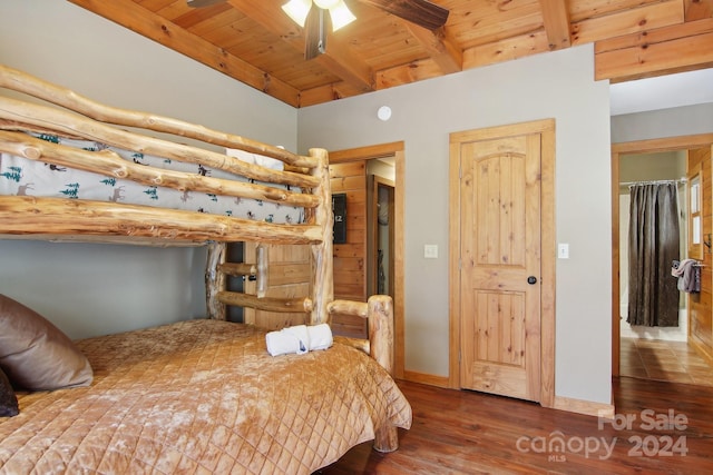 bedroom featuring ceiling fan, wooden ceiling, dark hardwood / wood-style floors, beamed ceiling, and a closet