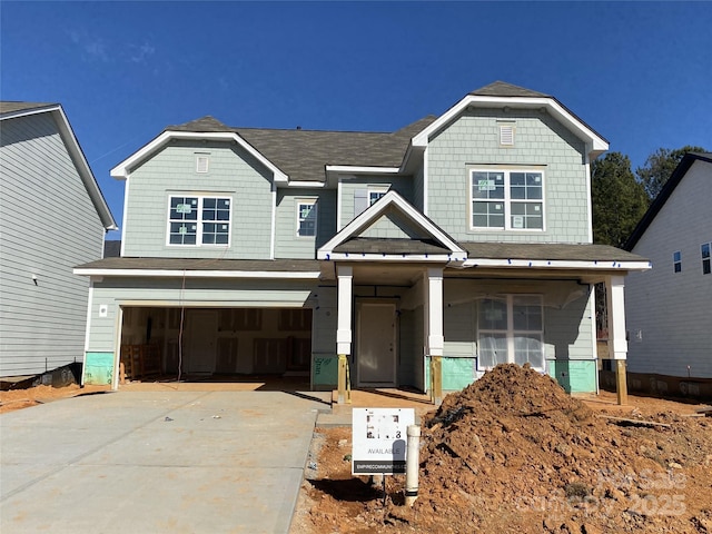 craftsman-style home with a garage