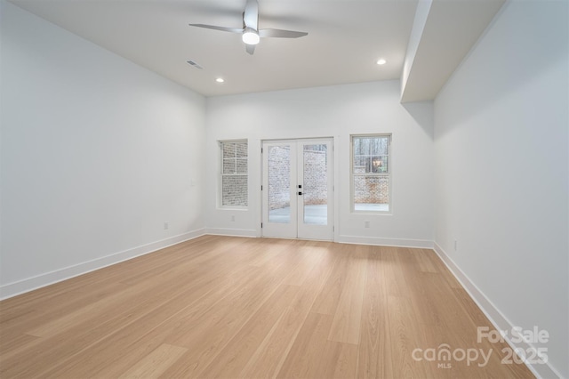 6630 Vesuvius Furnace Rd Unit 1, Denver, NC 28037 - spare room featuring light wood-style flooring, french doors, baseboards, and ceiling fan
