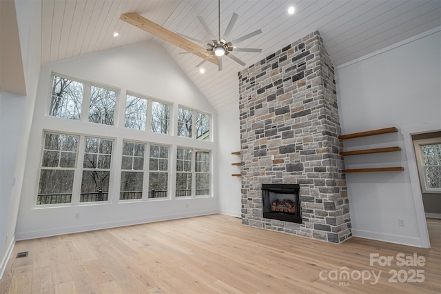 6630 Vesuvius Furnace Rd Unit 1, Denver, NC 28037 - unfurnished living room featuring a fireplace, wooden ceiling, baseboards, and hardwood / wood-style floors