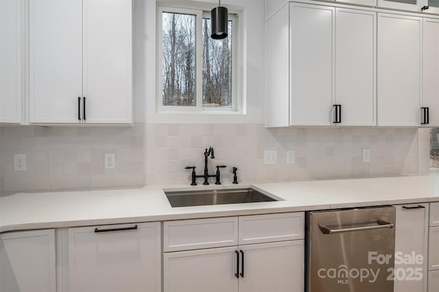 6630 Vesuvius Furnace Rd Unit 1, Denver, NC 28037 - kitchen with a sink, decorative backsplash, white cabinets, and light countertops