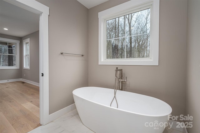 6630 Vesuvius Furnace Rd Unit 1, Denver, NC 28037 - full bath featuring recessed lighting, baseboards, a soaking tub, and marble finish floor