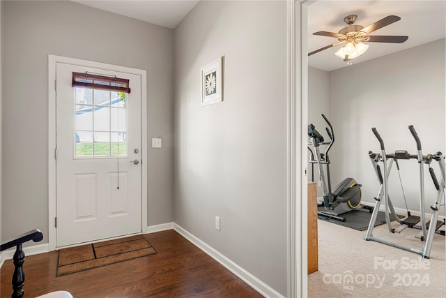 entrance foyer with dark wood-type flooring and ceiling fan