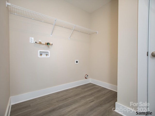 washroom featuring electric dryer hookup, hookup for a washing machine, and dark wood-type flooring