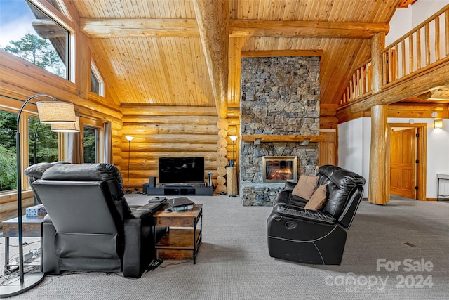 living room with wood ceiling, high vaulted ceiling, beam ceiling, and a fireplace