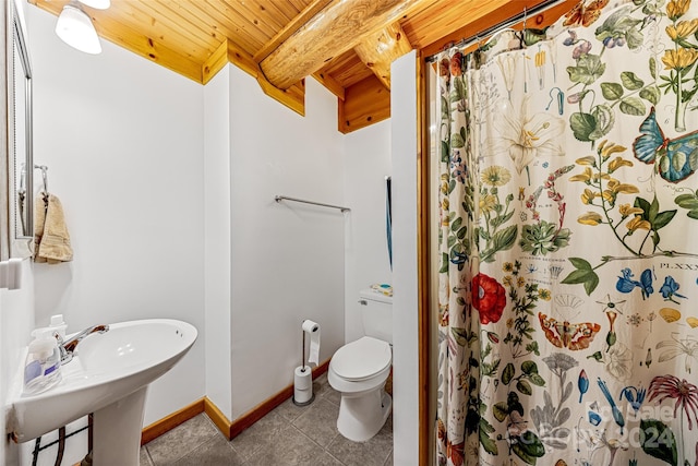 bathroom with toilet, wood ceiling, a shower with curtain, and tile patterned flooring