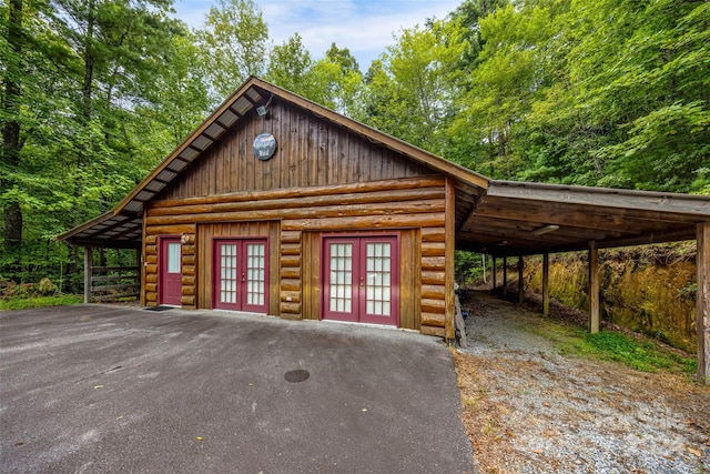 exterior space featuring a carport