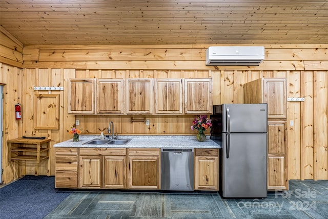 kitchen with sink, an AC wall unit, stainless steel appliances, wooden ceiling, and dark carpet