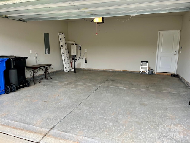 garage featuring a garage door opener and electric panel