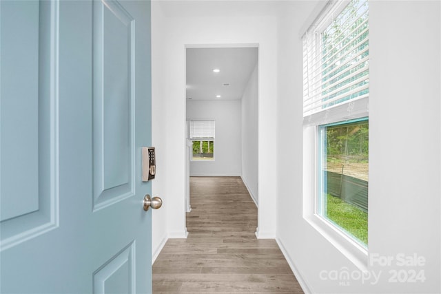 hall featuring light wood-type flooring