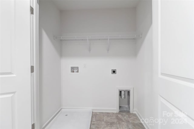 laundry area with electric dryer hookup and hookup for a washing machine