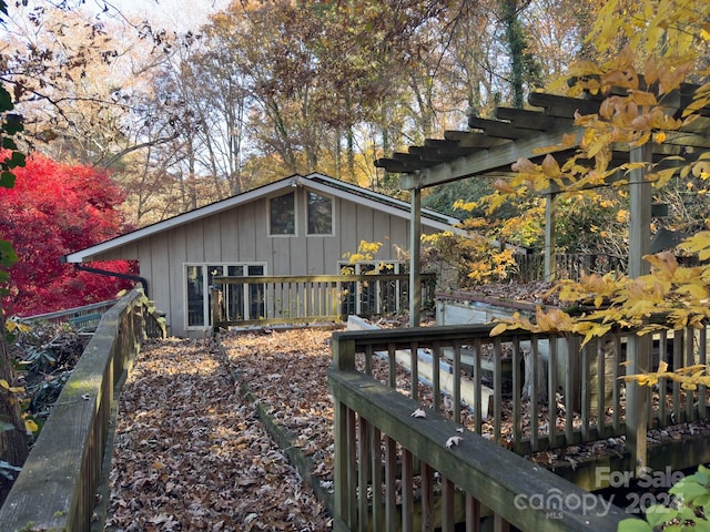 view of home's exterior featuring a pergola