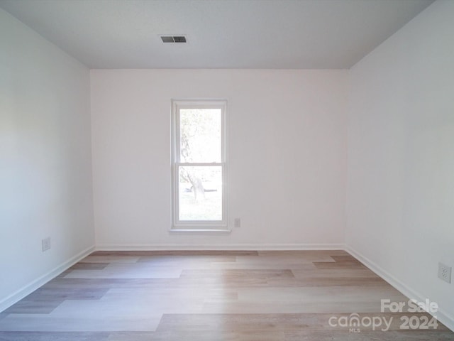 empty room with light wood-type flooring