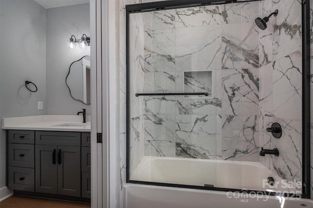 bathroom featuring shower / bath combination and vanity