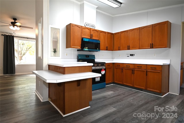 kitchen featuring kitchen peninsula, black appliances, crown molding, and dark hardwood / wood-style flooring