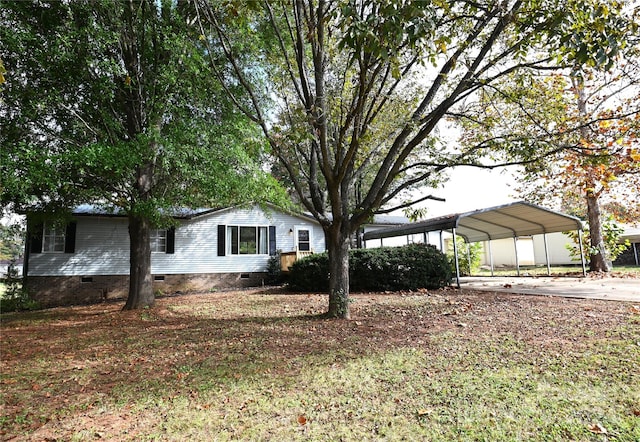 view of home's exterior featuring a carport