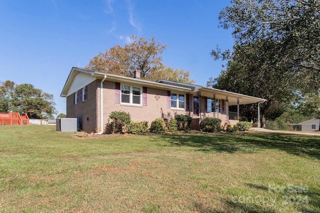 ranch-style house with a porch and a front yard