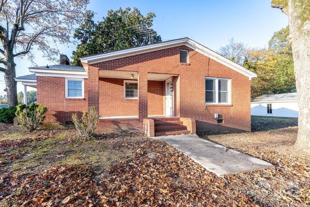 24947 Nc-24/27 Hwy, Albemarle, NC 28001 - bungalow-style home featuring brick siding, crawl space, and a chimney