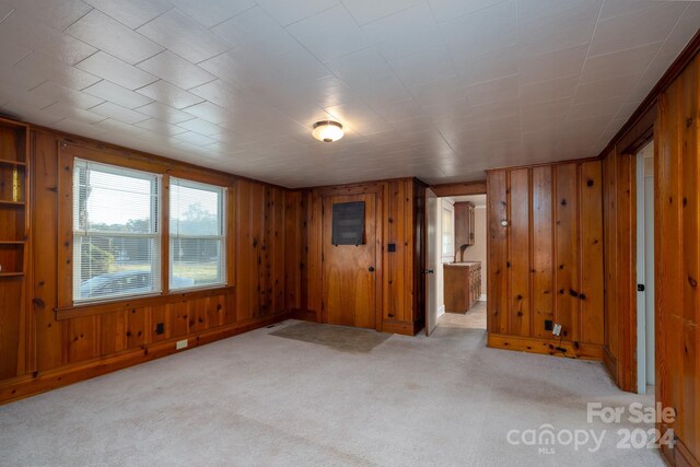 24947 Nc-24/27 Hwy, Albemarle, NC 28001 - carpeted empty room with wooden walls