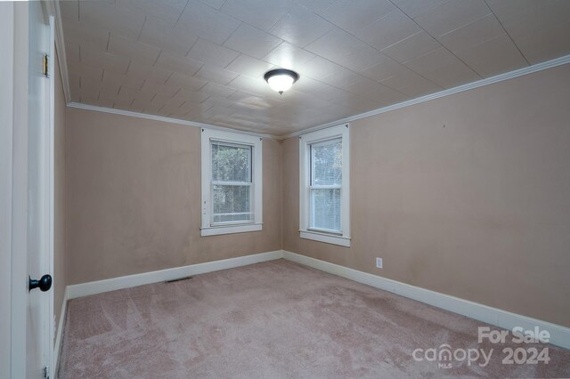 24947 Nc-24/27 Hwy, Albemarle, NC 28001 - carpeted empty room featuring crown molding and baseboards