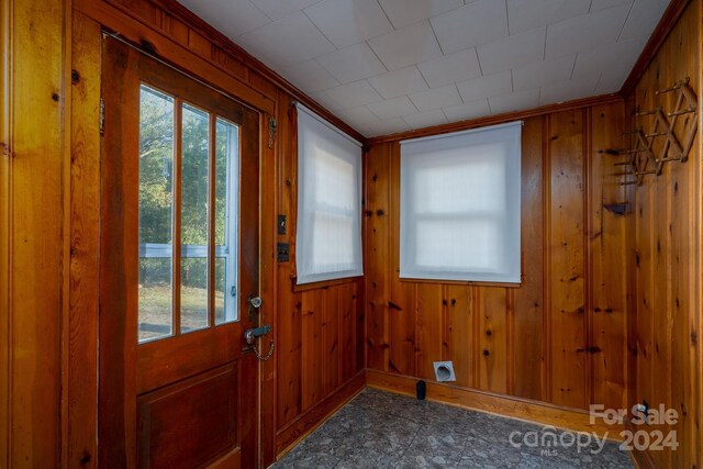 24947 Nc-24/27 Hwy, Albemarle, NC 28001 - entryway featuring plenty of natural light, wooden walls, and crown molding