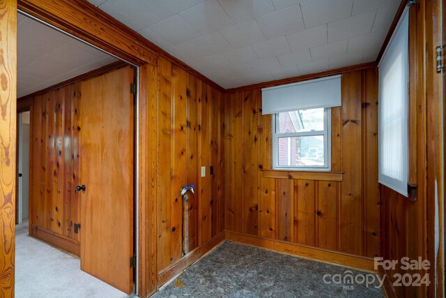 24947 Nc-24/27 Hwy, Albemarle, NC 28001 - empty room featuring wooden walls and crown molding