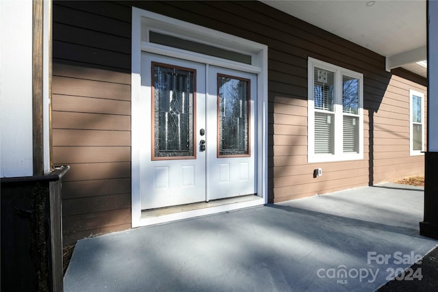 property entrance with french doors