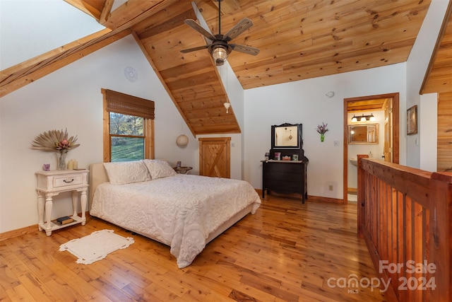 bedroom featuring wood ceiling, ceiling fan, light hardwood / wood-style flooring, and vaulted ceiling with beams