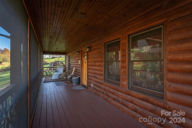 wooden terrace with covered porch