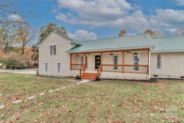 view of front of property with a porch and a front yard