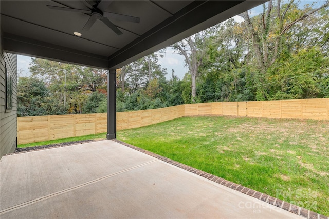 view of patio featuring ceiling fan