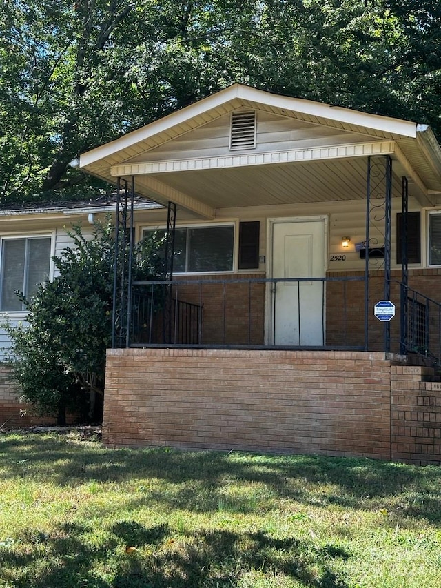 exterior space with a lawn