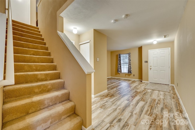 entrance foyer with light wood-type flooring