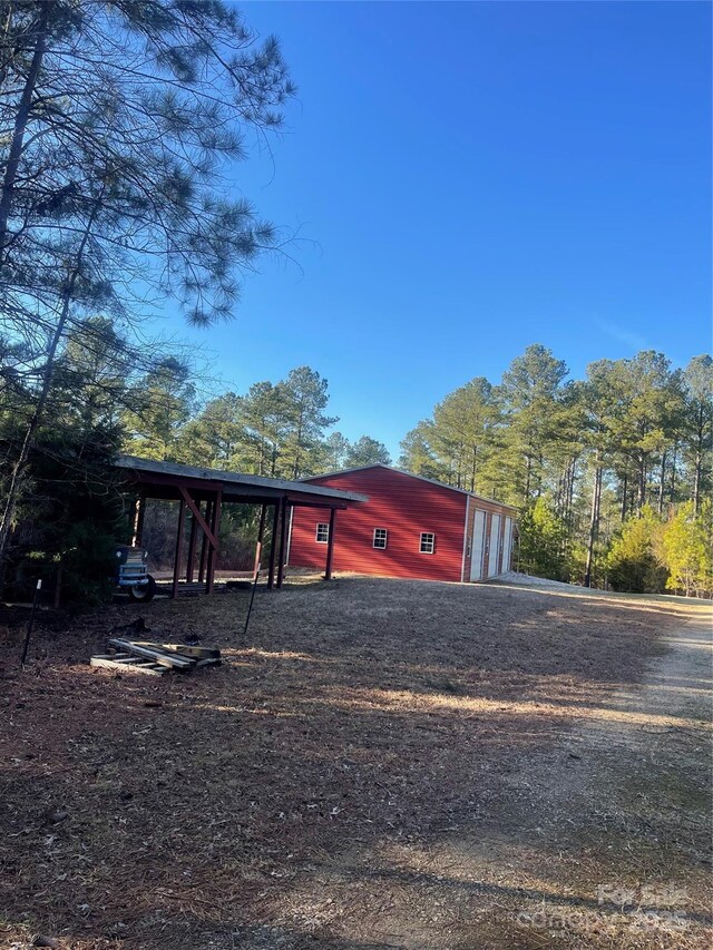 view of outbuilding with a garage