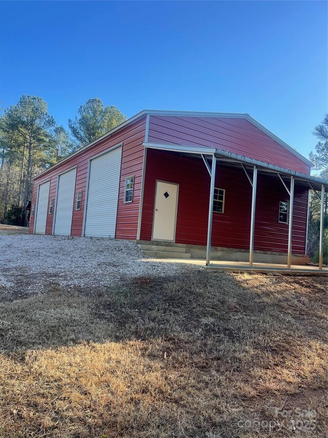 view of outbuilding featuring a garage