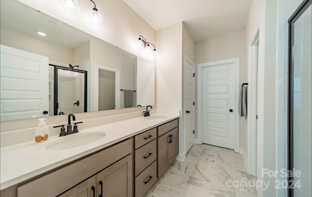 bathroom with vanity and walk in shower