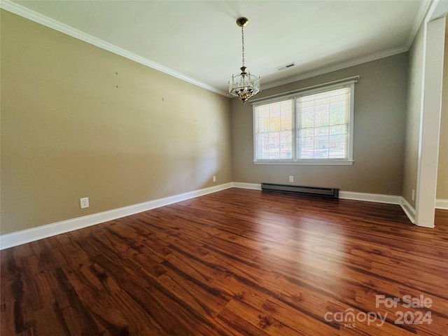 unfurnished room featuring dark wood-type flooring, ornamental molding, a baseboard radiator, and an inviting chandelier