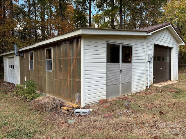 view of outdoor structure featuring a garage