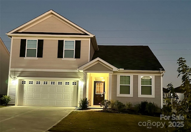 view of front of home featuring a garage