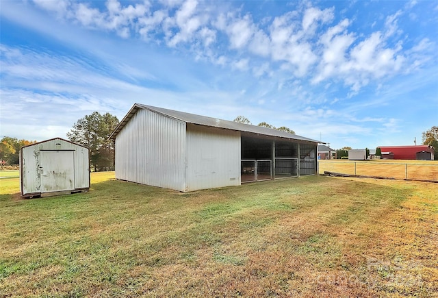 view of outdoor structure featuring a yard